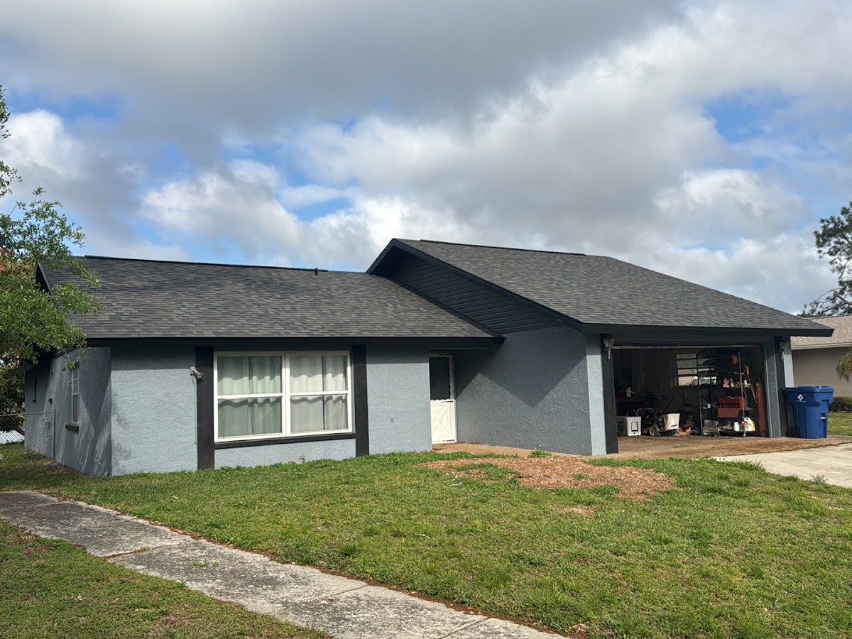 Residential exterior with a shingle roof